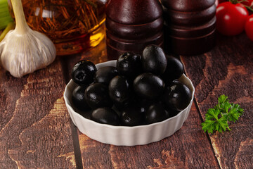 Mediterranean marinated Black olives in the bowl