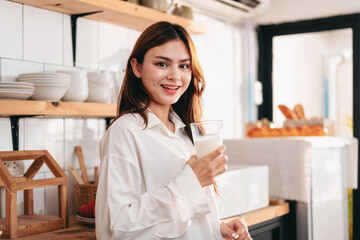 Activity at home leisure lifestyle concept, Young woman in clothes casual standing in kitchen room...