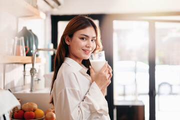 Activity at home leisure lifestyle concept, Young woman in clothes casual standing in kitchen room...