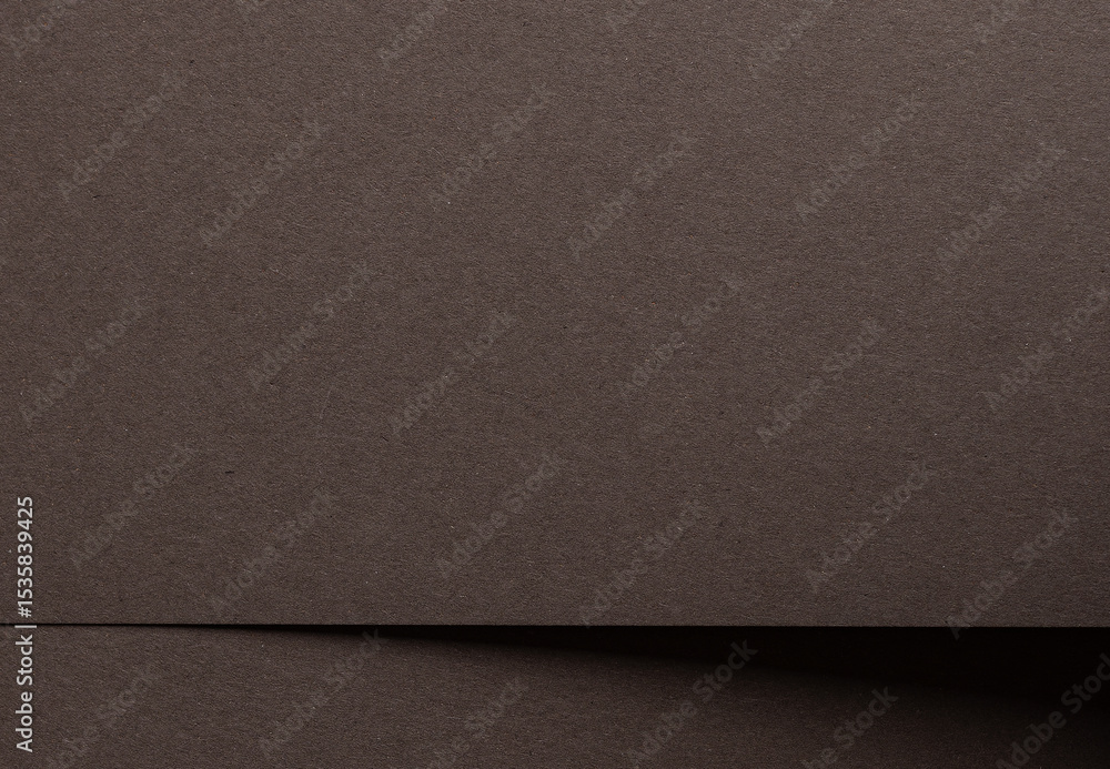 Poster premium dark brown paper with a smooth matte texture, offering an elegant minimalistic backdrop. the