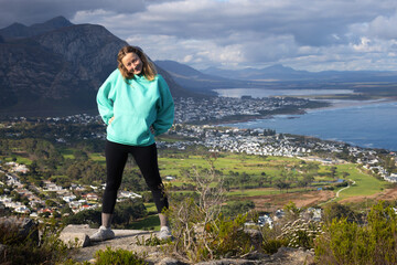 Woman Posing at Coastal town Viewpoint