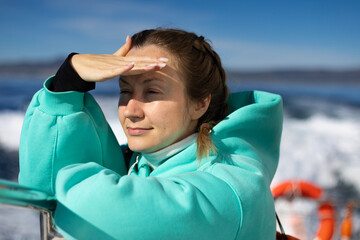 Woman on a Yacht Looking at the Horizon