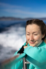 Woman on a Yacht Looking at the Horizon