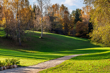 Winding road. Beautiful autumn landscape with a walking path in the countryside in autumn in a mountainous area