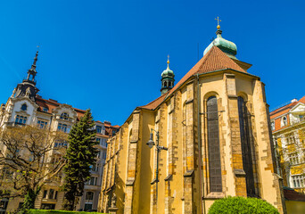 A view of buildings on the northwest corner of the old town square in central Prague in springtime