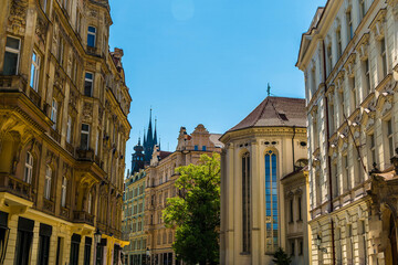A view of ornate buildings in a street in the Jewish quarter of Prague in springtime