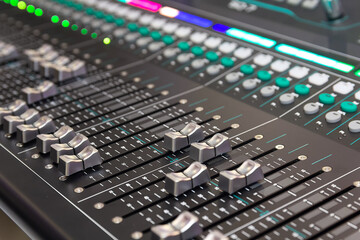 Large professional equalizer in studio. Mixer control panel, sound and music recording industry,