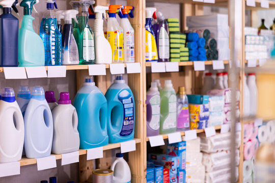 Racks full of large stock of different home care products in supermarket