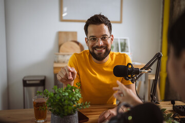 caucasian man on podcast talk about home plants and gardening