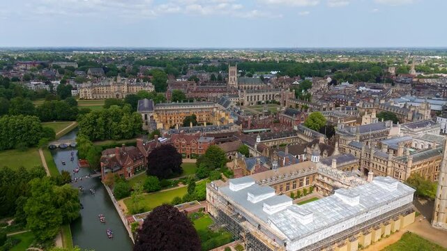 Panoramic aerial view of Cambridge University colleges, river Cam, and boats, in Cambridge, England, United Kingdom