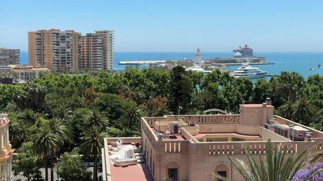 Malaga, Spain - aerial view of Malaga city and beach from Alcazaba, ferry boats and sea