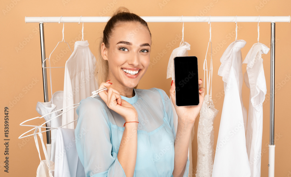 Leinwandbilder online sales and mobile application. smiling lady showing smartphone with black empty screen for moc
