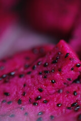 Close up shot of vibrant pink dragon fruit texture
