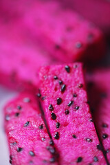 Close up shot of vibrant pink dragon fruit texture
