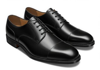 Pair of black leather oxford shoes isolated on white background