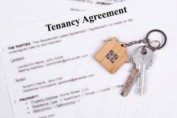 Tenancy Agreement contract. Short and long term rentals in England, United Kingdom (UK) or Great Britain, housing searching crisis, signing lease agreement, and rising prices.