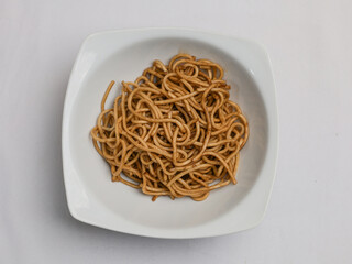 Fried soba noodles in white plate