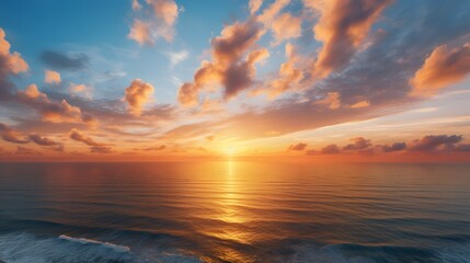 Fototapeta premium Stunning sunrise over the ocean coastal landscape nature photography tranquil environment wide-angle view golden rays