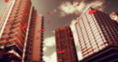 Showing cluster of three skyscrapers rising in downtown street canyon, with glowing red particles