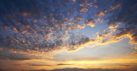 a dramatic sunset with lumpy yellow clouds
