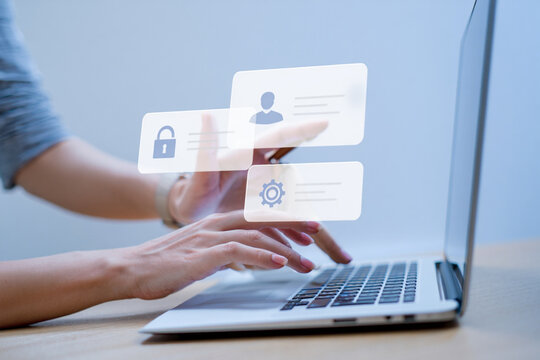 Woman using laptop with digital security and profile settings interface