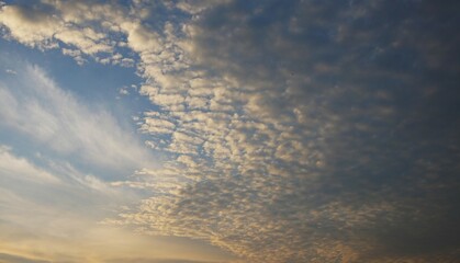 evening sky with yellow clouds, dramatic evening sky with lumpy yellow clouds