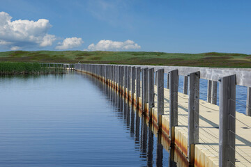 Wooden walkway on the lake in prince edward island Canada.