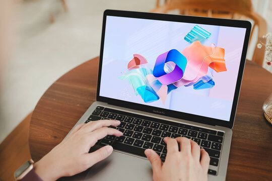 Bangkok, Thailand. June 17, 2025; Person using a laptop displaying the Microsoft Copilot AI assistant logo, illustrating modern technology and productivity tools.
