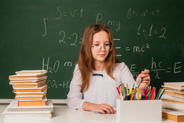 School girl. School child. School dream. Portrait of elementary pupil looking at camera. Schoolkid or preschooler. Portrait of pupil of primary school study indoors.