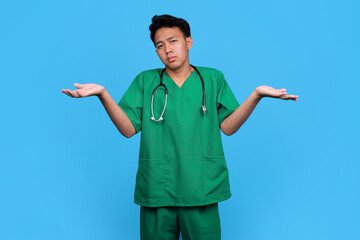 Asian Doctor in Uniform and Stethoscope Shrugging Shoulders, Feeling Clueless Confused