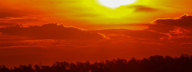 Banner Golden sky sunrise dramatic beautiful landscape view. Dawn sky gold dusk time cloudscape with sunlight. Panorama Dramatic sunset scenic landscape. Beautiful landscape nature with copy space