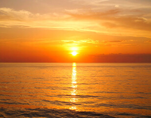 Obraz premium Beautiful sunset on Andaman sea at Windmill View Point near Laem Pornthip Cape, Phuket, Thailand