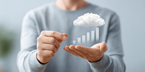 A person holds a digital bar graph with a cloud icon, symbolizing cloud computing and data growth.