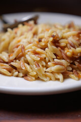 Delicious orzo pasta served with a savory sauce