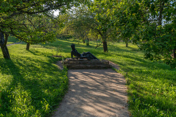 Monument to Alexander Pushkin in the apple orchard of the Mikhailovskoye estate of the Pushkin...