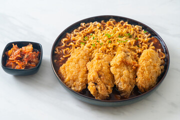 Korean instant noodles with fried chicken or Fried chicken ramyeon