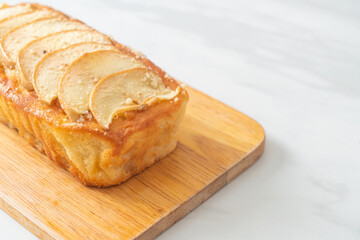 apple loaf crumbled on wood board