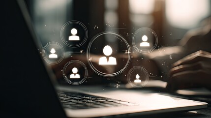 team collaboration icons above laptop with digital overlay