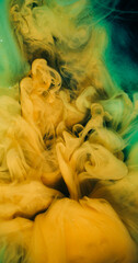 Cloud splash. Ink colorful fluid. Yellow green mist explosion paint flow. Art fog spill defocused color water fantasy blend background.