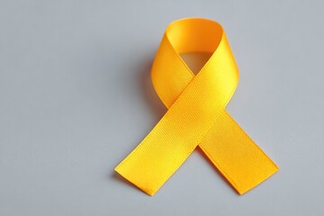 minimalistic arrangement of yellow ribbons symbolizing awareness for world hepatitis day with ample copy space