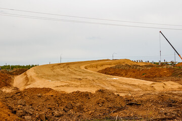 Construction of sand embankment during construction of road junction