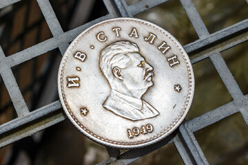 Engraved profile of Joseph Stalin on a modern souvenir coin