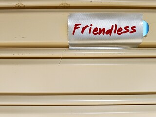 Duck tape with text written FRIENDLESS - someone who have no friends, adulthood loneliness which...