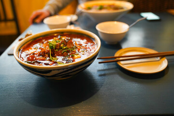 A bowl of warm Vietnamese pho served in a restaurant in South Korea.
