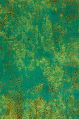 Rusty metal surface with peeling green paint outdoors