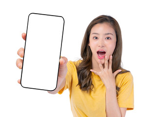 Surprised Asian woman holding and showing blank smartphone screen in hand, amazed facial...