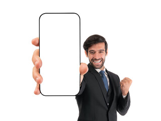 A confident smiling businessman in a dark suit, enthusiastically presenting a blank smartphone...