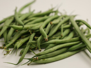 Common beans piled on white background