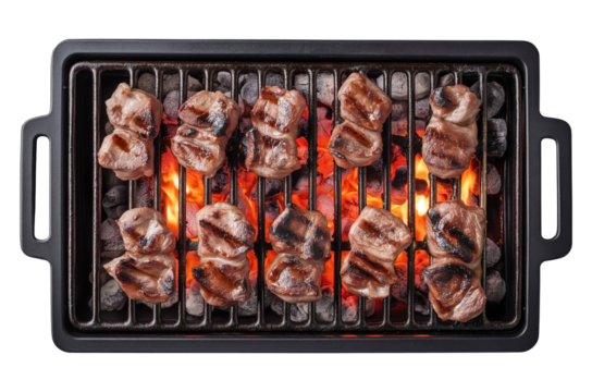 Sizzling cuts of pork belly cooking on black metal barbecue grill with visible flames beneath isolated on transparent background