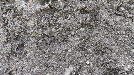 Aged concrete wall with stone texture and grunge elements, vintage surface background showing...